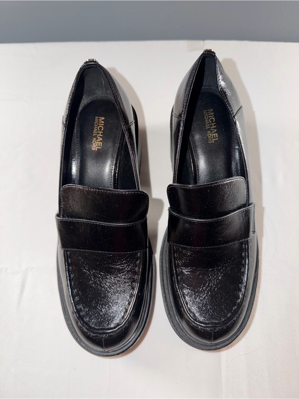 Michael Kors Black Leather Rocco loafers with a chunky block heel and penny slot